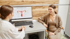 How to Prepare for Your First Endometriosis Specialist Appointment 17 a woman meeting with an endometriosis specialist in a doctor's office