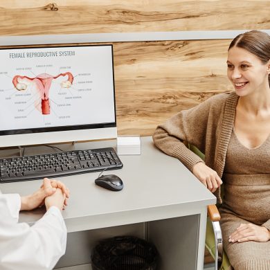 a woman meeting with an endometriosis specialist in a doctor's office